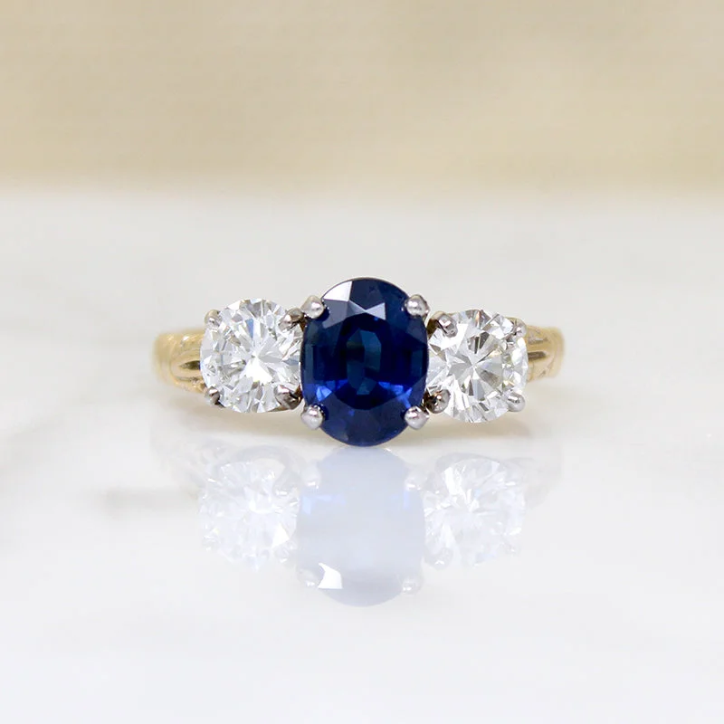 trendy wedding rings for women -Breathtaking Sapphire & Diamond Trilogy Ring